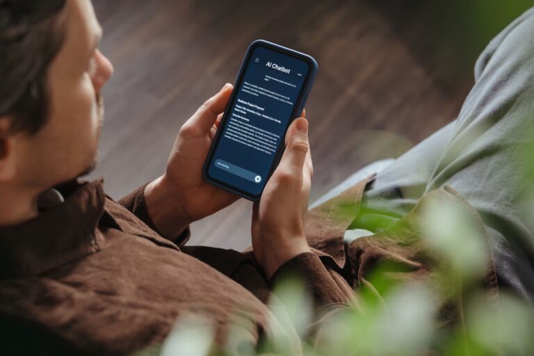 Carroll County resident weighing AI vs Google search on his smartphone